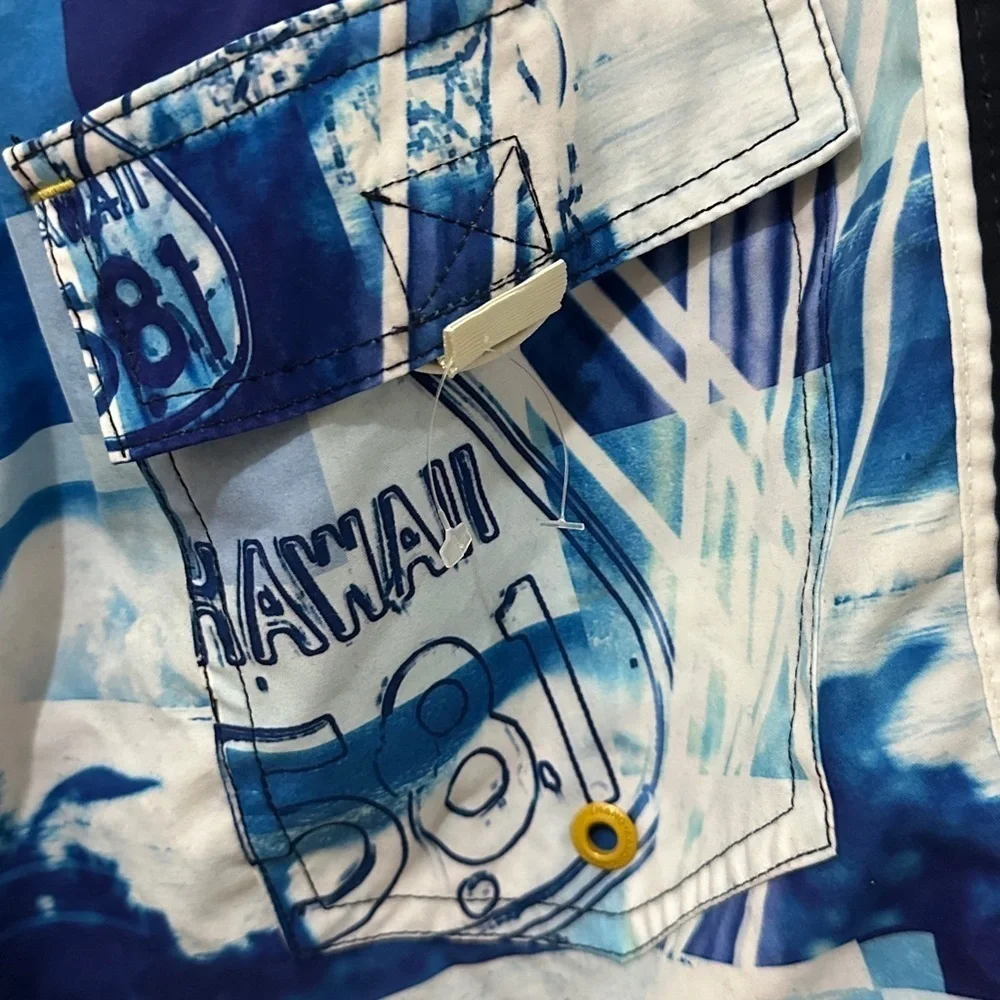 250 Hawaiian 581 | EUC Brazil Men’s Vintage Blue Surf Print Board Shorts (Sz 29)